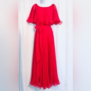 Vintage late 1960s, early 1970s formal dress. Pleated, ruffled chiffon.